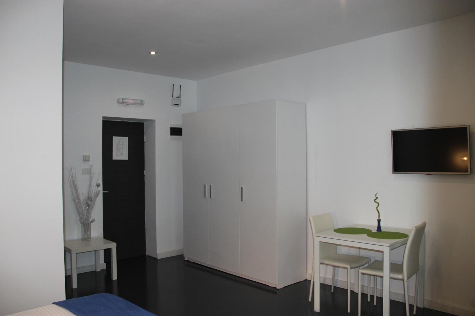 Living Aparthotel Bucarest Camera foto