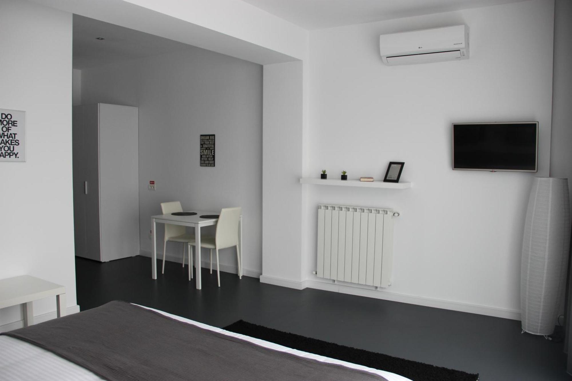 Living Aparthotel Bucarest Camera foto