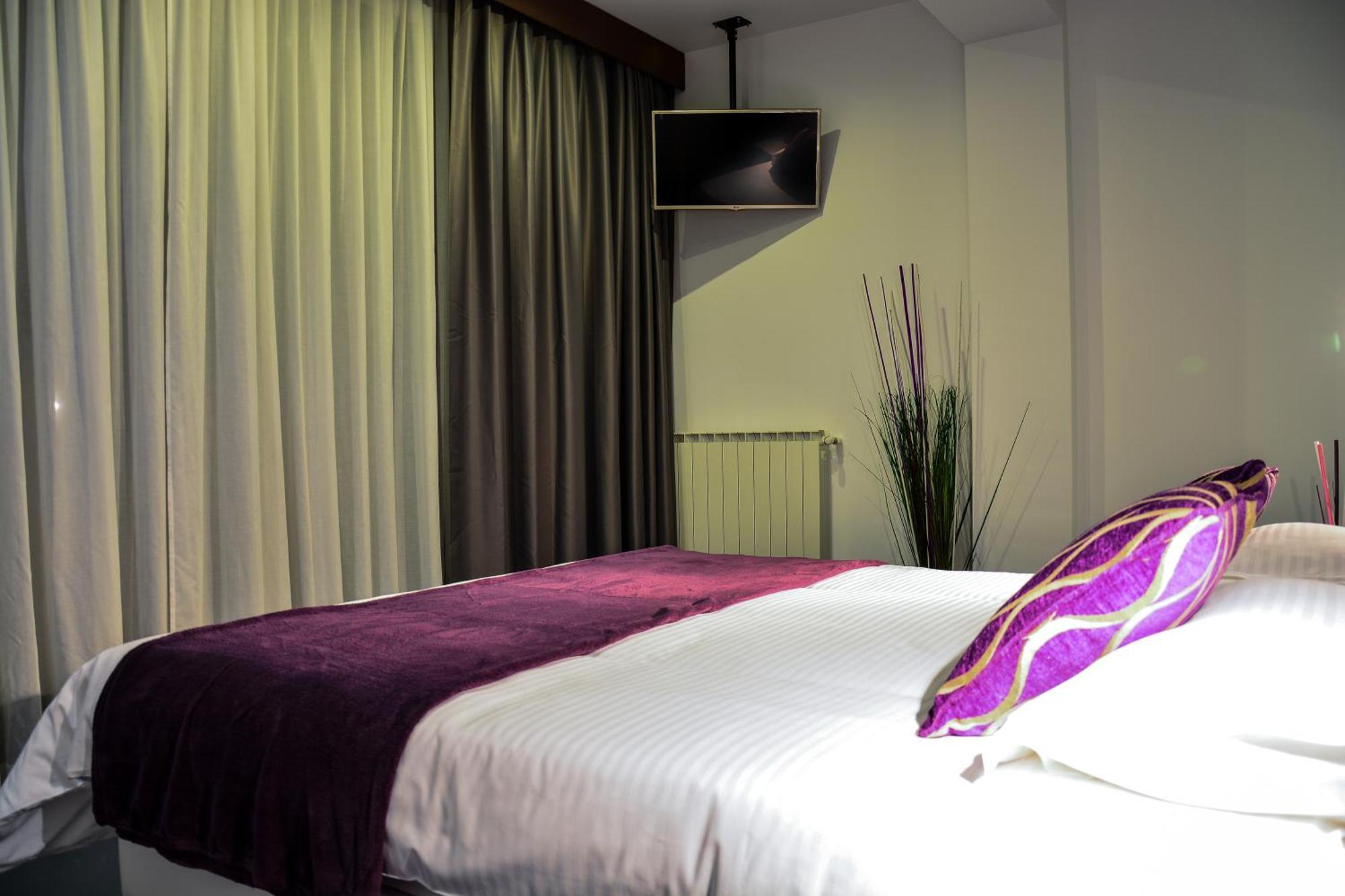 Living Aparthotel Bucarest Camera foto